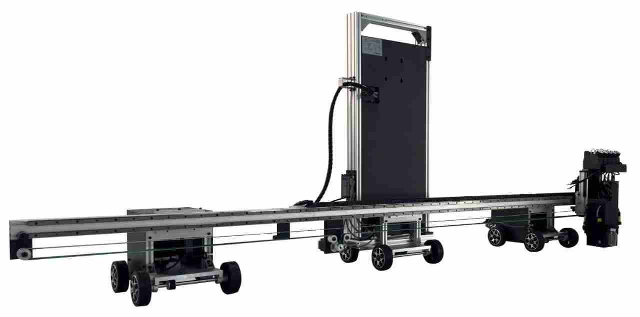 The NWP-FL1 floor printer — a vertical print column on a long horizontal rail with wheeled carriages