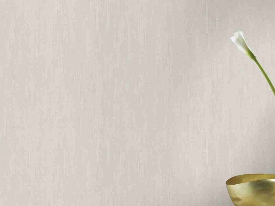 A lightly textured wallpapered wall